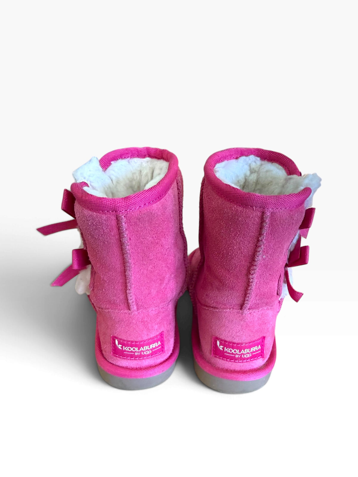 Koolaburra by UGG hot pink bow boots back view showing logo